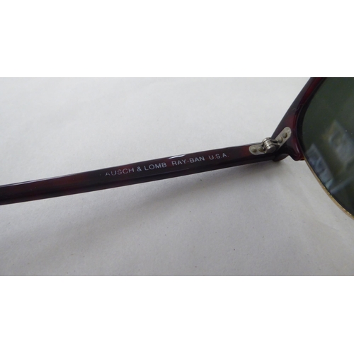 55 - A pair of Bausch & Lomb, Ray-Ban sunglasses (with prescription lenses)