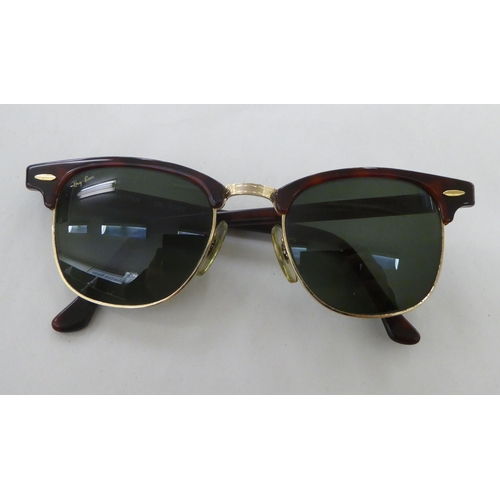 55 - A pair of Bausch & Lomb, Ray-Ban sunglasses (with prescription lenses)
