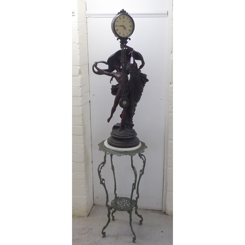 57 - A modern reproduction of a 19thC Continentally inspired timepiece, featuring two classical dancing f... 