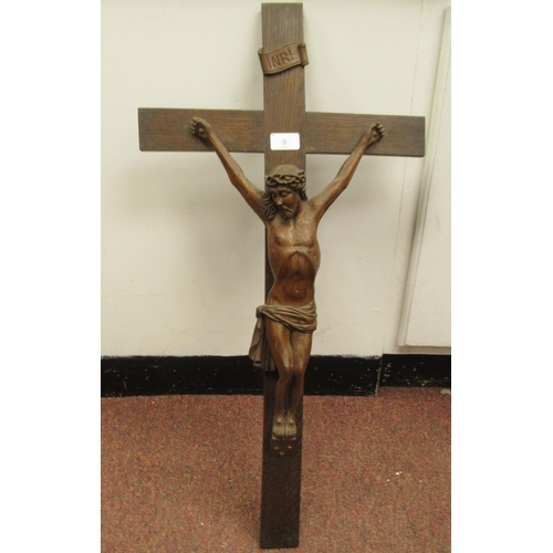 9 - A late 19thC carved oak crucifix, a banner on the cross, inscribed 'RNRI' and inscribed L Verbeke&nb... 