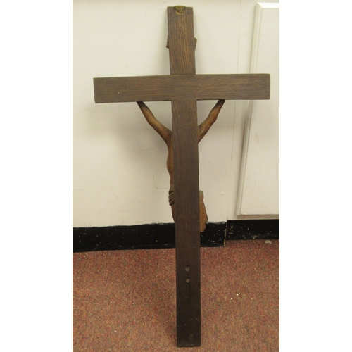 9 - A late 19thC carved oak crucifix, a banner on the cross, inscribed 'RNRI' and inscribed L Verbeke&nb... 