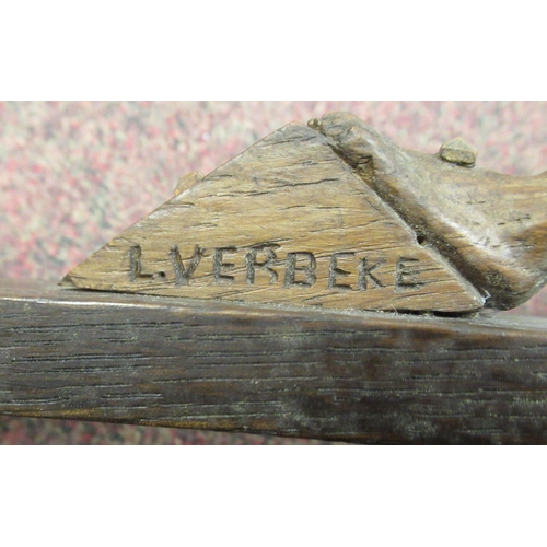 9 - A late 19thC carved oak crucifix, a banner on the cross, inscribed 'RNRI' and inscribed L Verbeke&nb... 