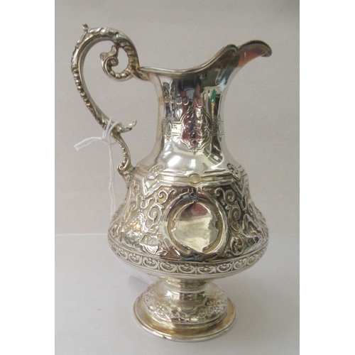 12 - A Victorian silver pedestal cream jug&nbsp; London 1892