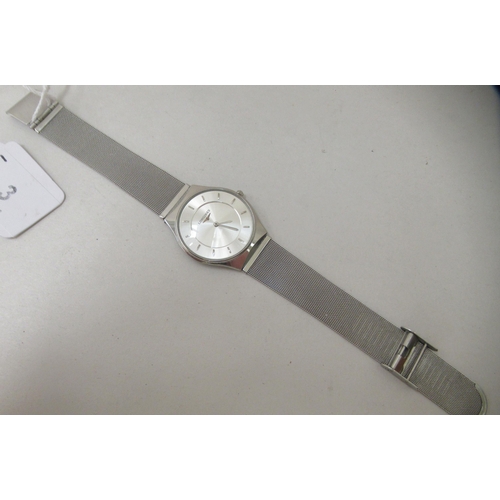 3 - A Longines stainless steel cased and strapped wristwatch, the quartz movement faced by a baton dial ... 