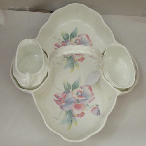 32 - An Aynsley china Little Sweetheart pattern strawberry dish with sugar basin and cream jug