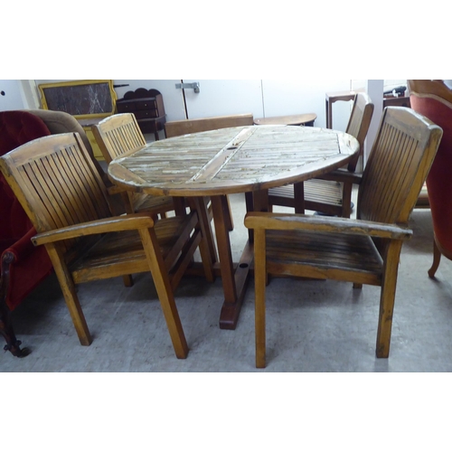 326 - A modern Sustainable Furniture teak terrace set&nbsp; comprising a table and four chairs