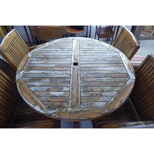 326 - A modern Sustainable Furniture teak terrace set&nbsp; comprising a table and four chairs