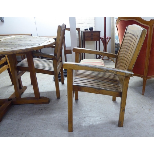 326 - A modern Sustainable Furniture teak terrace set&nbsp; comprising a table and four chairs