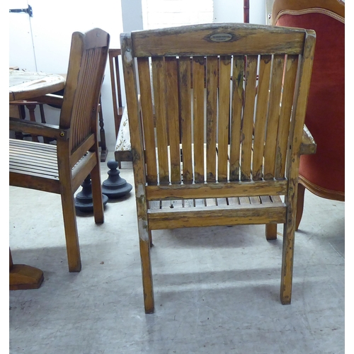 326 - A modern Sustainable Furniture teak terrace set&nbsp; comprising a table and four chairs