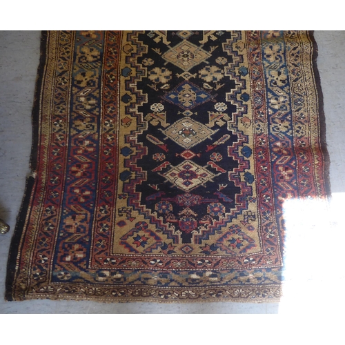 43 - A Persian runner, on a multi-coloured ground  41