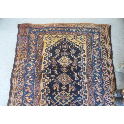 43 - A Persian runner, on a multi-coloured ground  41