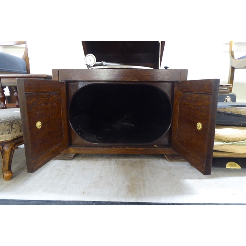45 - A circa 1920s EMG oak cased cabinet gramophone  17