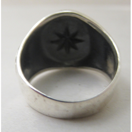 46 - A silver coloured metal nautical style ring  stamped 925
