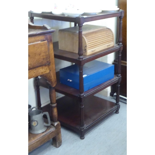 47 - A late 19thC mahogany four tier what-not, elevated on turned pillars&nbsp; 33
