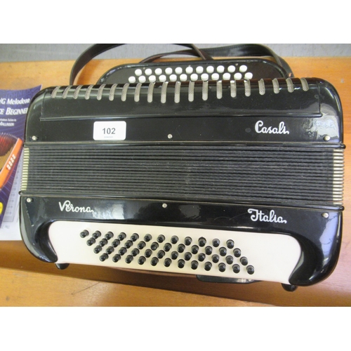 102 - A Verona Casali black lacquered melodeon