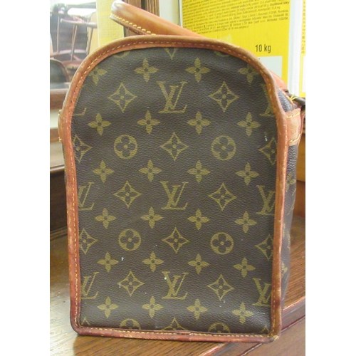 107 - A Louis Vuitton make-up bag with stitched brown hide handles