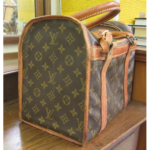 107 - A Louis Vuitton make-up bag with stitched brown hide handles