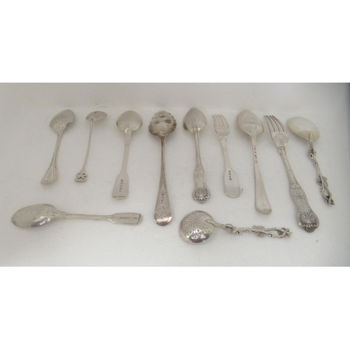 118 - Silver flatware: to include an 18thC Old English pattern tablespoon, a sifter spoon on a fruiting vi... 