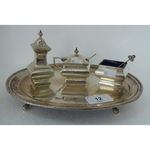 12 - Silver and white metal collectables: to include a silver three piece condiments set  Mappin & We... 