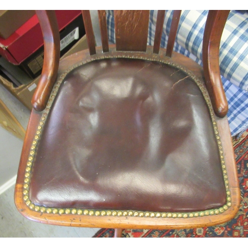 122 - A 1930s Hillcrest mahogany framed swivel desk chair