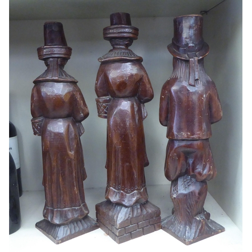 124 - Six stained and carved wooden standing New World figures, possibly Quakers/Plymouth Brethren  18