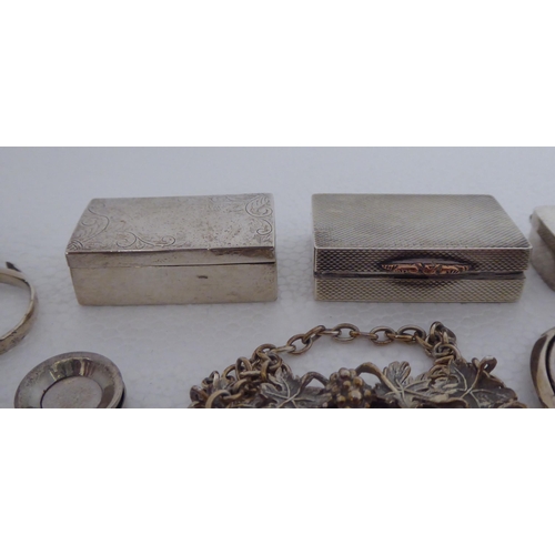 147 - Silver and silver coloured metal trinket boxes and other collectables: to include sugar nips; and a ... 