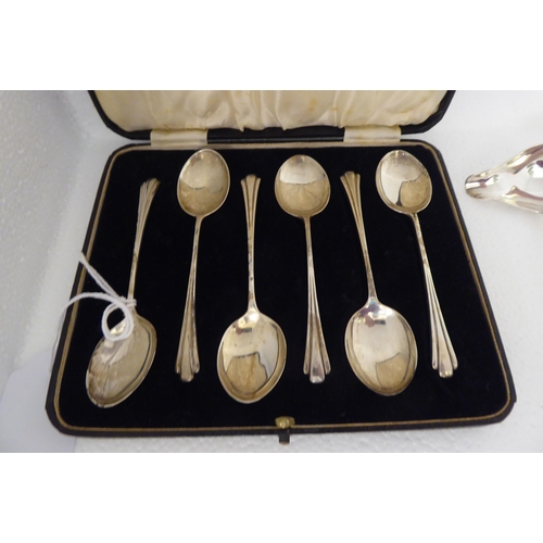 157 - A set of six Art Deco inspired silver teaspoons  cased; and miscellaneous silver flatware  mixed mar... 