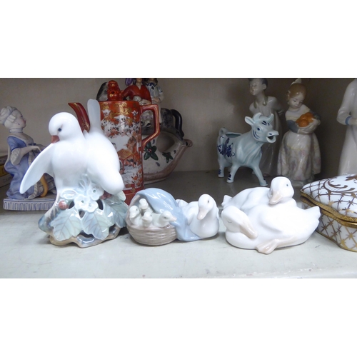 158 - Ornamental ceramics: to include Lladro porcelain figures  largest 8