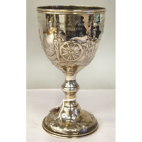 170 - A mid Victorian silver trophy cup of ovoid form, on a knopped pedestal and domed foot, embossed and ... 