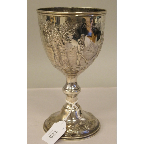 170 - A mid Victorian silver trophy cup of ovoid form, on a knopped pedestal and domed foot, embossed and ... 