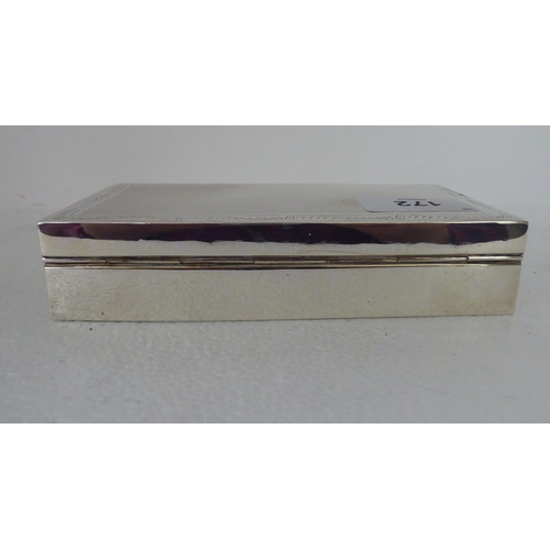 172 - A silver cigarette box with engine turned decoration and a cedar lined interior  Birmingham 196... 