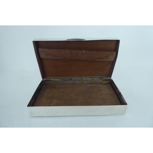 172 - A silver cigarette box with engine turned decoration and a cedar lined interior  Birmingham 196... 