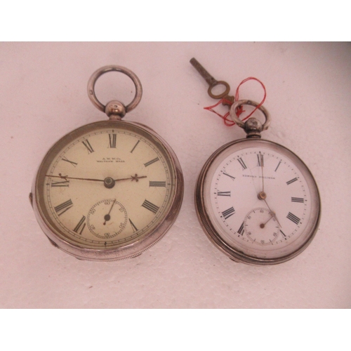 191 - Two silver cased pocket watches, faced by Roman dials and subsidiaries; and two engraved silver case... 