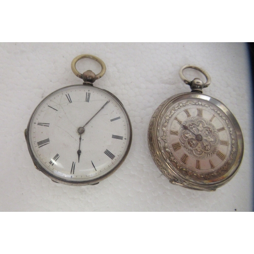 191 - Two silver cased pocket watches, faced by Roman dials and subsidiaries; and two engraved silver case... 