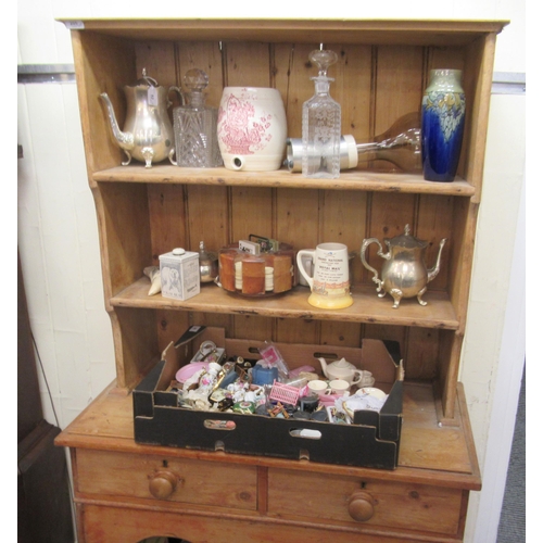 205 - A Victorian and later pine dresser with two open shelves, over two drawers and an open section below... 