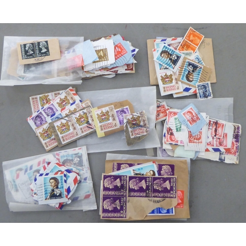 209 - A miscellaneous collection of uncollated postage stamps: to include Chinese issues  