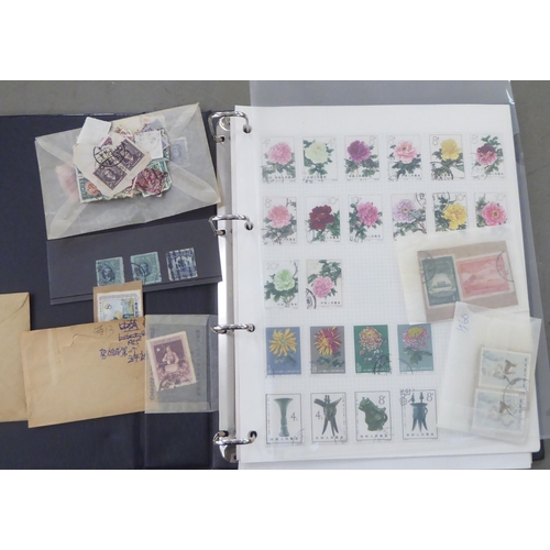 209 - A miscellaneous collection of uncollated postage stamps: to include Chinese issues  