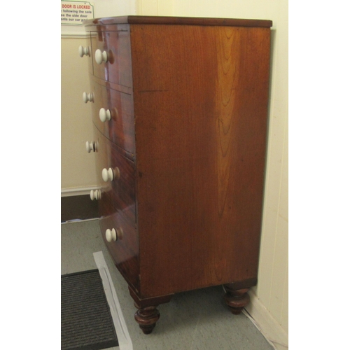 235 - An early 19thC mahogany bow front dressing chest with two short/three long drawers, raised on turned... 