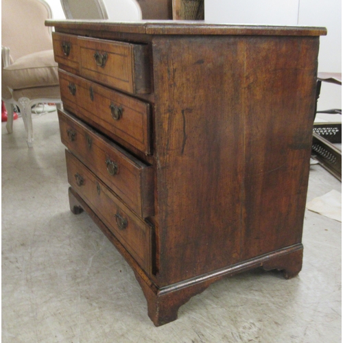 243 - A late 18thC style walnut veneered dressing chest with crossbanded and string inlaid ornament, compr... 