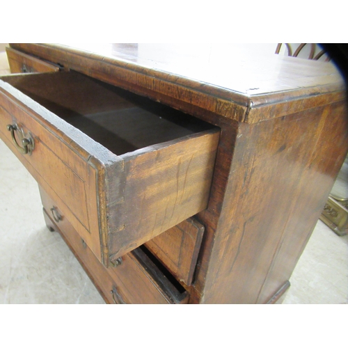 243 - A late 18thC style walnut veneered dressing chest with crossbanded and string inlaid ornament, compr... 