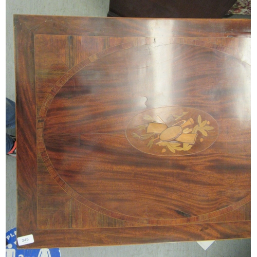 245 - An Edwardian satinwood inlaid mahogany side table, the top with marquetry ornament, over a frieze dr... 