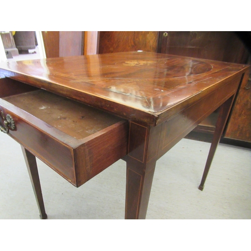 245 - An Edwardian satinwood inlaid mahogany side table, the top with marquetry ornament, over a frieze dr... 