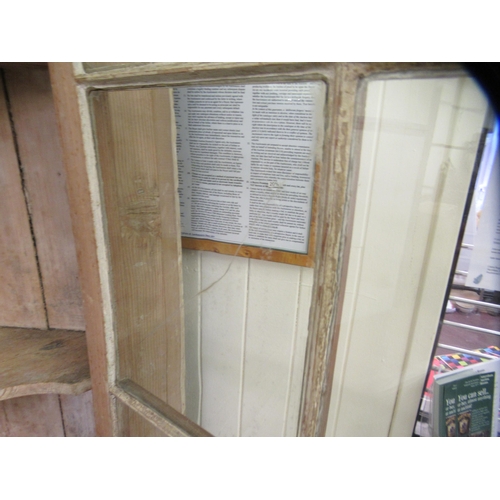 247 - A late Victorian pine corner cabinet with a dentil moulded cornice, over an astragal glazed door, a ... 