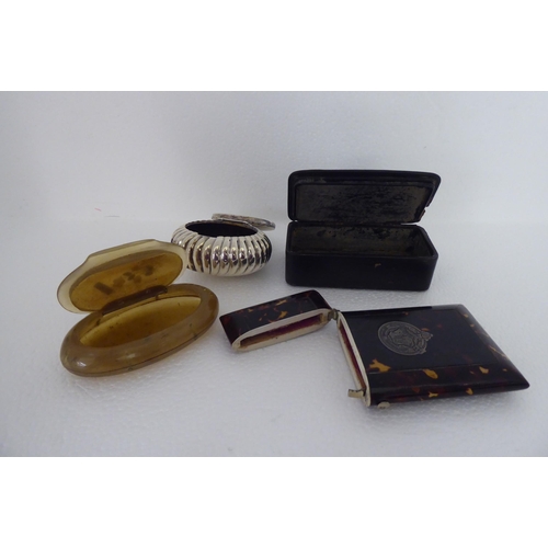 272 - A silver oval reed moulded pill box with a hinged lid  London 1894; two dissimilar snuff boxes;... 