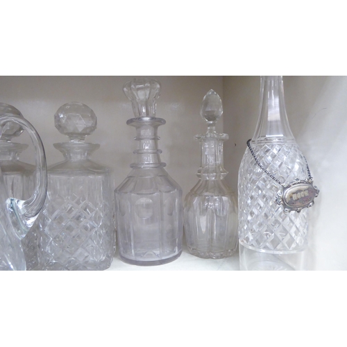 273 - Decorative glassware: to include a pair of cut crystal, shouldered, square whisky decanters