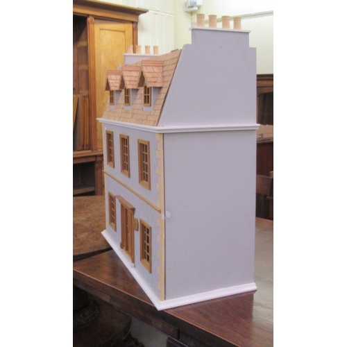 293 - A modern dolls house with hinged doors, on a plinth  32