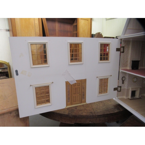 293 - A modern dolls house with hinged doors, on a plinth  32