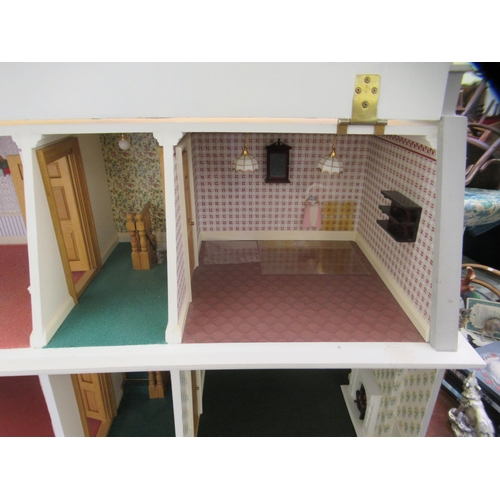 293 - A modern dolls house with hinged doors, on a plinth  32