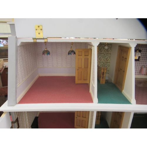 293 - A modern dolls house with hinged doors, on a plinth  32