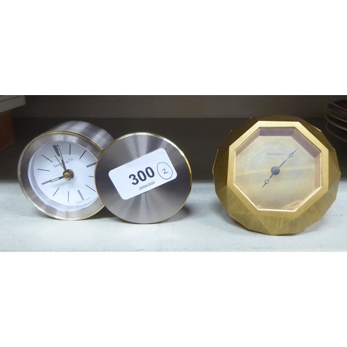 300 - Two variously cased and designed quartz movements Tiffany & Co timepieces with plain dials